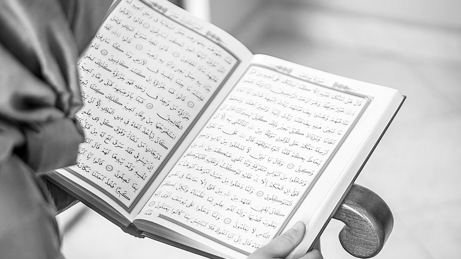 Woman reading holy Quran